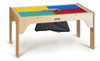 Jonti-Craft Wood DUPLO® Rectangle Storage Table 32 x 16 inches, a wooden children’s table with colorful DUPLO® brick storage surface and a black fabric storage bag underneath.