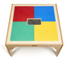 Jonti-Craft Wood DUPLO® Square Storage Table 27 inches by 27 inches with colored Lego base plates in red, blue, green, and yellow on a light wooden table surface.