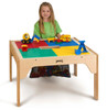 Jonti-Craft Wood DUPLO® Square Storage Table 27" x 27" with a child playing with colorful building blocks and toys on the tabletop.