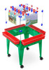 Childbrite Children's Space Saver Art Easel, 4 Stations - 24 inches tall, featuring a green base with red trays, a clear magnetic dry erase board, and colorful art panels for children's creative activities.