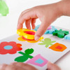 Guidecraft Flower Pot Sort and Match Manipulative, colorful stacking flower-shaped toys and puzzle pieces for children's fine motor skills development.
