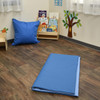 Children's Factory Two Tone Activity Mat - Deep Water/Sky Blue, blank folded blue activity mat on wooden floor in a children's playroom.