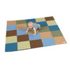 Children's Factory Patchwork Activity Play Mat, Woodland, colorful checkered foam mat with a toddler playing on it.