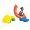 Children's Factory Rainbow Arch Trio Soft Play Climber, a colorful soft play set with rainbow arches and a crescent moon-shaped climbing structure.