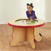 Playscapes MyPlate Magnetic Activity Table, young girl playing with magnetic food pieces on the table's surface, educational toy for children.