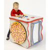 PlayScapes Exploration Island Wooden Activity Cube, child playing with various interactive maze and puzzle features on a colorful wooden activity cube designed for children's exploration and development.