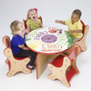 Playscapes Veggie Kids Table & Chairs Set, children's playful activity table with colorful vegetable-themed design and four matching wooden chairs with red seats.
