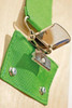 HABA Pro Learning Wall Dip B Sensory Wall Panel, close-up of green textured surface with metallic mirror and safety lock.