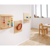 HABA Pro Colorful Squares Activity Sensory Wall Toy, colorful educational wall-mounted sensory panels for children with various textured and shaped elements for motor skill development.