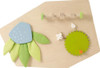 HABA Pro Grow.upp Motor Skills Sensory Activity Wall Panel, educational wooden sensory wall panel for children with colorful leaf and fruit shapes and interactive elements for developmental play.