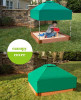 Frame It All Hexagon Sandbox Kit with Telescoping Canopy & Cover, 7' x 8' x 5.5", showing a child playing inside the sandbox under a green canopy in a backyard.