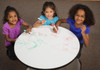 Playscapes Brainstorming Idea & Creativity Kid's Drawing Table, image of three happy young girls drawing and coloring on a white round table with markers in a classroom or play area. Playscapes Brainstorming Idea & Creativity Kid's Drawing Table, image of three happy young girls drawing and coloring on a white round table with markers in a classroom or play area.