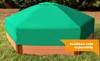 Frame It All Collapsible Sandbox Cover Hexagon 7ft x 8ft, green protective cover on a sandbox with a wooden base outdoors in a garden setting.