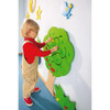 HABA Pro Cherry Tree Interactive Wall Decor, a child engaging with a colorful, educational tree on a wall for interactive play and learning.