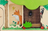 HABA Pro The Forest Activity Wall Panel Toy, wooden activity toy featuring forest-themed illustrations of a fox, a woodpecker, and a tree with a tree hollow and leaves.