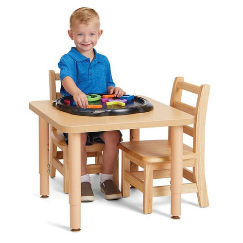 Jonti-Craft Purpose+ Square Table - 24" x 24" with a young boy sitting at the table, playing with colorful toys, and two wooden chairs, suitable for educational and playroom use.