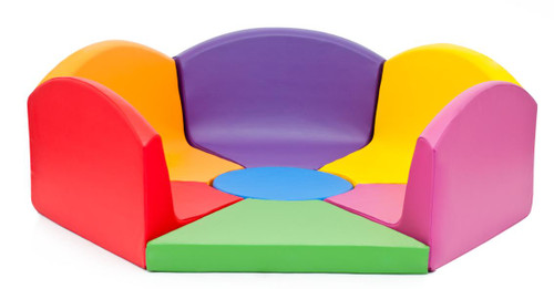 Novum Crocus Rainbow Play Circle, colorful cushioned children's play area with segmental padded sections in red, green, yellow, purple, and pink.