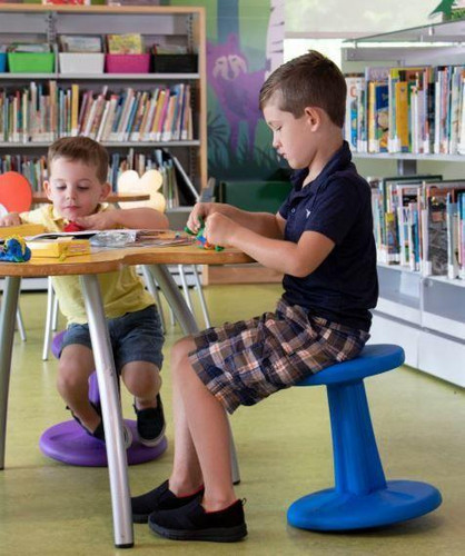 Playscapes Active Learning Wobble Stool, 14 inches high, in use by children in a classroom for active seating and improved focus.