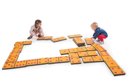 Novum Giant Dominos Floor Game, large foam domino tiles arranged on the floor with children playing and building a domino course.