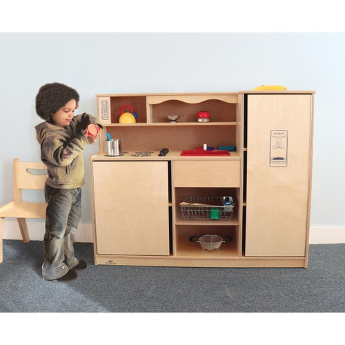 Whitney Brothers Preschool Toy Kitchen Combo, a child's play kitchen set made of light wood with various kitchen accessories and appliances for imaginative play.