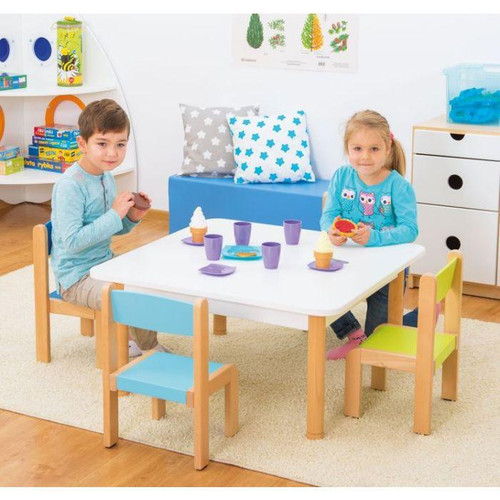 Moje Bambino Children's Classroom Table, 3 Shapes, 3 Colors, with children sitting and eating at the table in a classroom setting.