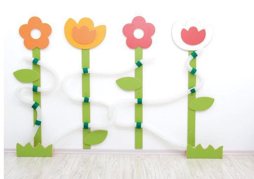 Moje Bambino Color Drome of Flowers Sensory Panel, colorful flower-shaped sensory wall panel with green stems and leaves, designed for early childhood development and sensory play.