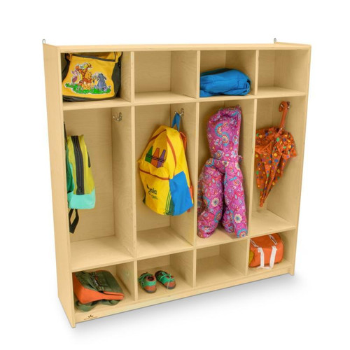 Whitney Brothers Four Section Coat Locker, wooden kids' coat storage unit with 12 cubbies holding backpacks, jackets, and umbrellas.
