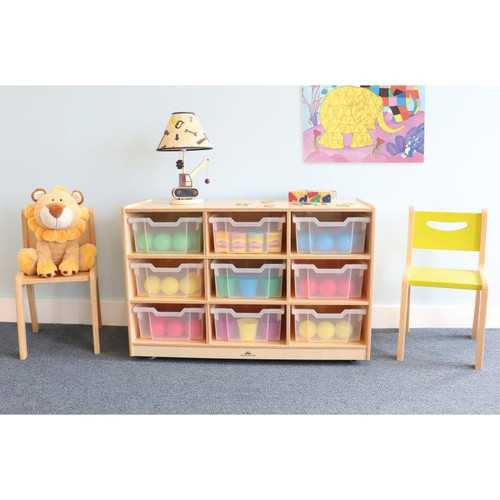 Whitney Brothers Nine Tray Mobile Gratnell Storage Cabinet, wooden storage unit with nine plastic trays filled with colorful balls, in a children's playroom setting.
