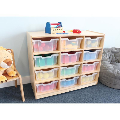 Whitney Brothers 12 Tray Mobile Gratnell Storage Cabinet, wooden storage unit with 12 clear plastic bins filled with colorful toys and balls, set in a room with a gray bean bag and plush lion toy.