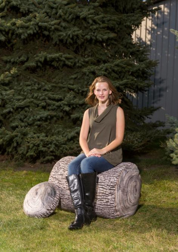 Playscapes Woodsmen Naturescape Mini Tree Trunk, a miniature tree trunk used as outdoor furniture.