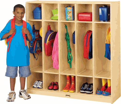 Jonti-Craft 5 Section Coat Locker, a wooden storage unit with five compartments used for organizing children's coats, backpacks, and shoes, with a young boy standing beside it.