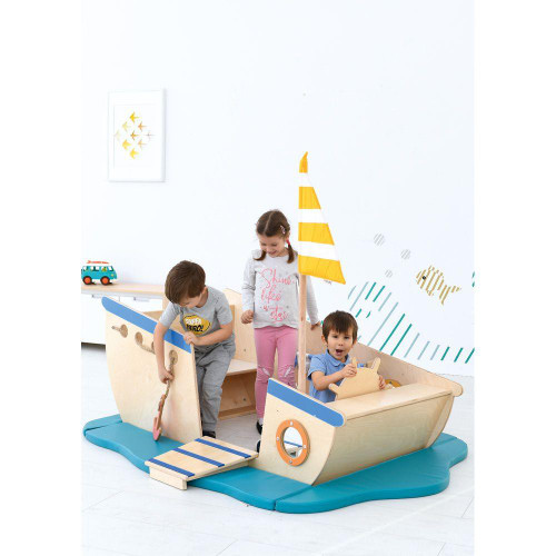 Moje Bambino Pirate Ship Play Boat Climber, children playing on a wooden pirate ship play boat with a sail and water base, indoor playground activity for kids