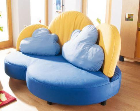 HABA Pro Clouds Couch with Pillows, colorful cloud-shaped sofa in a cozy living room.