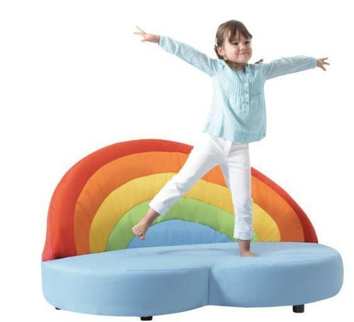HABA Pro Rainbow with Cloud Kids Couch, colorful rainbow-shaped cushioned furniture with a blue cloud and a young girl jumping excitedly on it