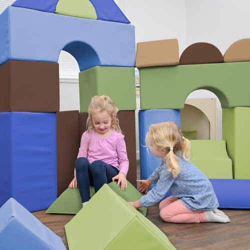 Children's Factory Woodland Large Foam Building Blocks - Set of 35, kids playing with colorful foam blocks as part of a play structure.