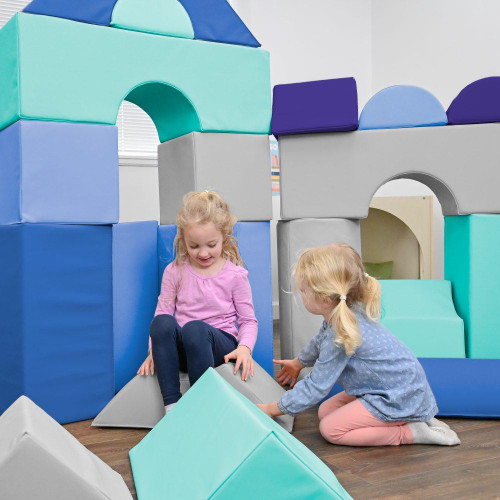 Children's Factory Tranquility Large Foam Building Blocks - Set of 35, children playing with colorful foam blocks in indoor play area.