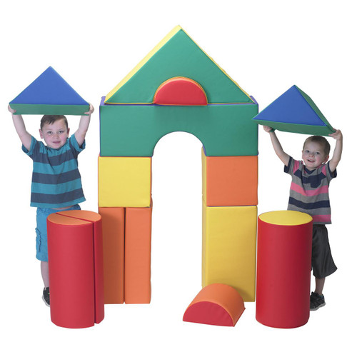 Children's Factory Rainbow Large Foam Building Blocks B - Set of 14, colorful foam blocks arranged to resemble a castle with two children holding triangular foam pieces.