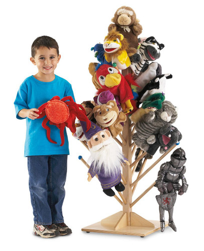 Jonti-Craft Puppet Tree, display of various colorful puppet animals on a wooden puppet stand with a young boy holding a red crab puppet.