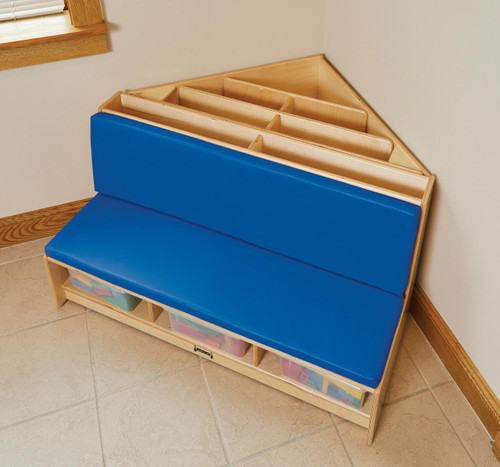 Jonti-Craft Corner Literacy Nook, wooden reading nook with blue upholstered seat and multiple storage compartments for books and educational toys.