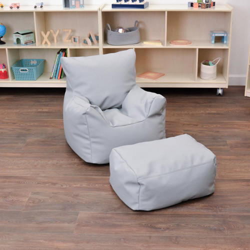 Children's Factory Cozy Soft Chair and Ottoman - Gray, soft cushioned children's chair and matching ottoman in a playroom setting.