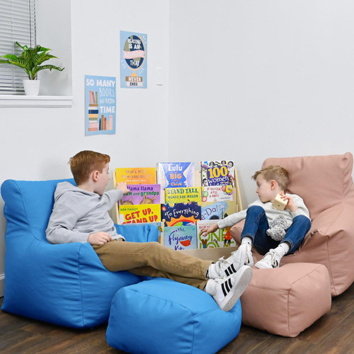 Children's Factory Cozy Soft Chair and Ottoman - Deep Water, children sitting on blue and pink soft chairs reading books in a cozy playroom.