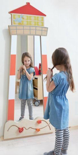 HABA Pro Lighthouse Safety Wall Mirror, child playing with mirror in playroom