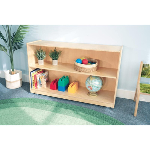 Whitney Brothers Mobile Bookshelf Cabinet 30H, wooden storage unit with three shelves holding books, toys, and decor items in a child-friendly room.