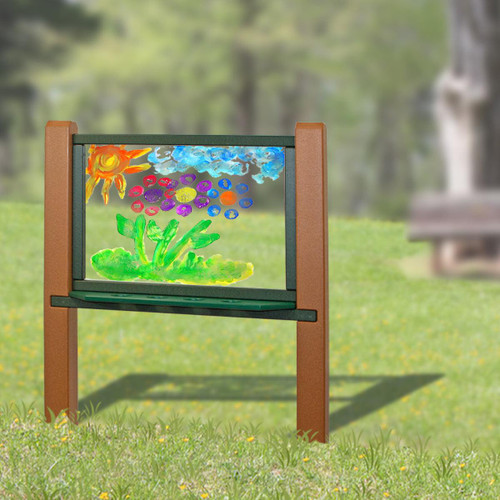 Playmore Designs Recycled Plastic Art Easel, colorful child-painted flower scene on transparent surface in outdoor setting.