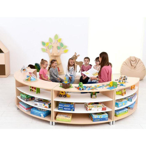 Moje Bambino Quadro 1/8 Curved Cabinet Bookshelf, modern wooden children's curved bookshelf filled with toys, books, and educational materials in a playroom.
