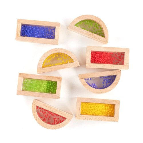Guidecraft Crystal Bead Wooden Rainbow Blocks, colorful wooden blocks with clear windows filled with beads in blue, green, red, and yellow color.