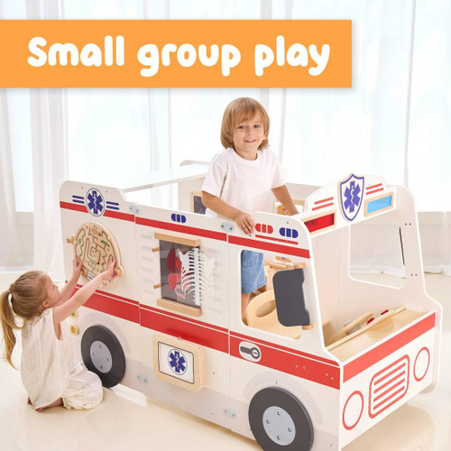 SPARK & WOW Super Ambulance Playhouse, a colorful small indoor ambulance-themed play house for children with medical-themed details and a small group play setting.