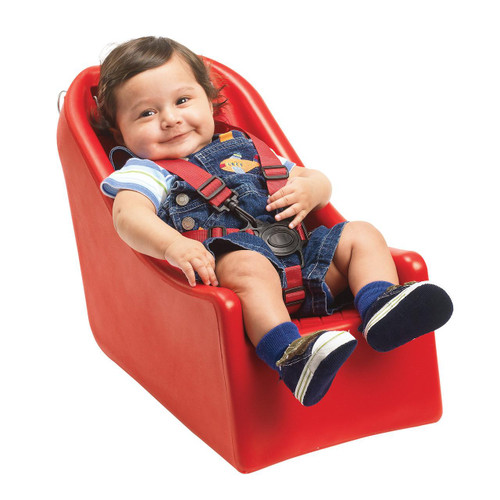 Angeles BYE BYE BUGGY Infant Seat, young child smiling and sitting comfortably in a red infant car seat with safety straps.
