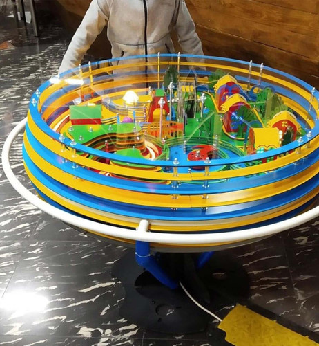 LiteZilla Twistopia Tabletop Labyrinth Game, colorful marble maze game with multiple levels and winding tracks.