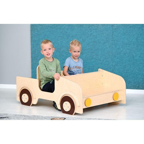 Moje Bambino Kiddie Play Car Interactive Play Seating, two young boys sitting in a wooden toy car with a minimalist design and yellow wheels, indoor play area.